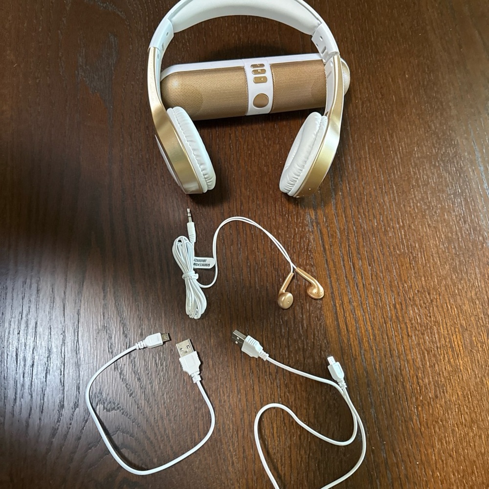 White and Gold Wireless Headphones with Gold Speaker and Earbuds